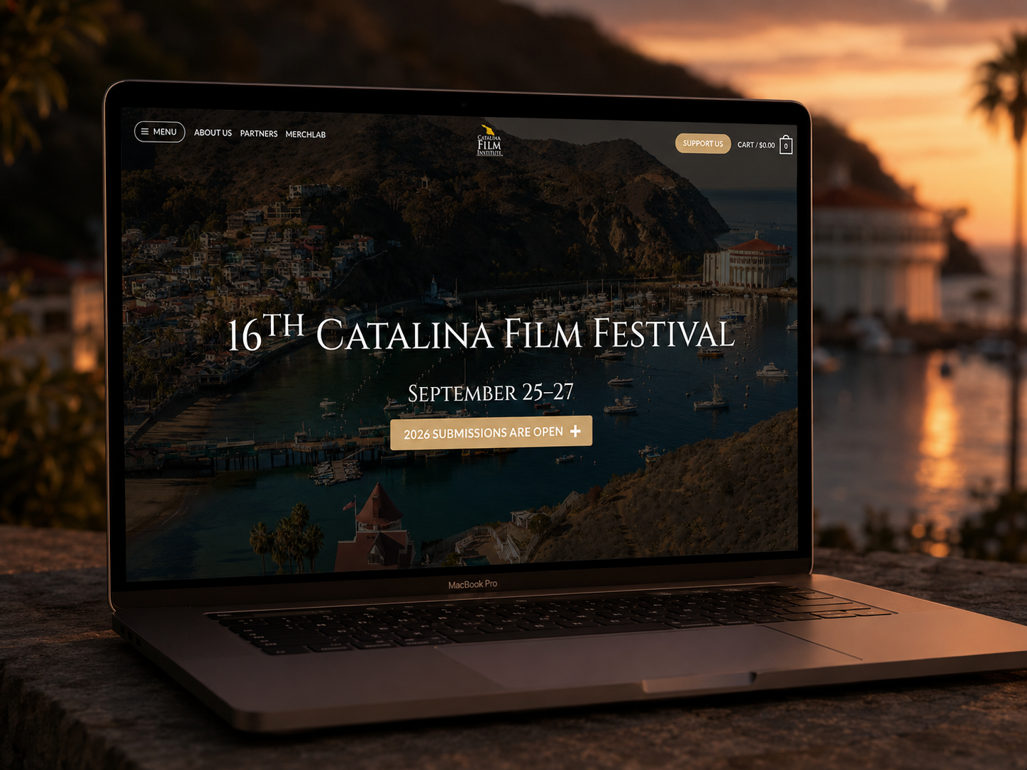Catalina Film Festival desktop mockup on a laptop at sunset.